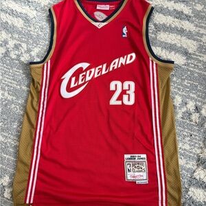 Red Cleveland Cavaliers #23 LeBron James basketball jersey by Mitchell & Ness.